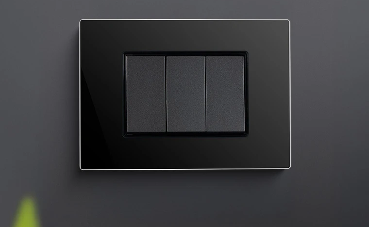 Minimalist matte black modular switch plates for contemporary industrial farmhouse interiors in Anaikatti and Attappadi.